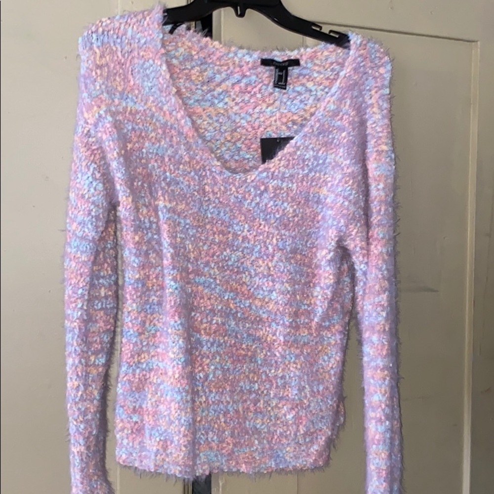 Small fuzzy warm top w/ tag
